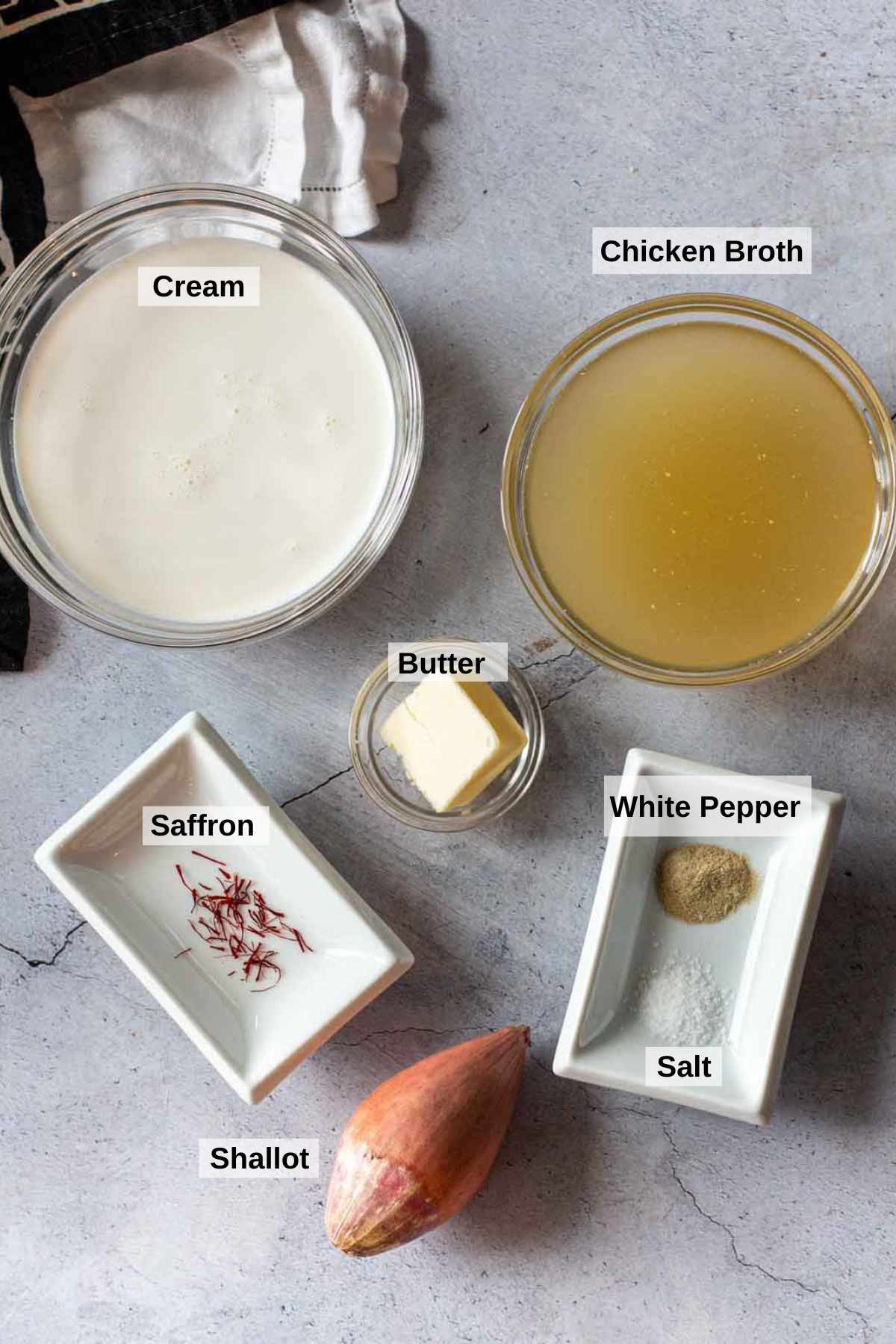 Ingredients to make saffron cream sauce.
