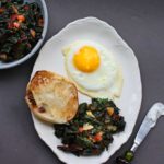 Swiss chard and fried egg with an english muffin