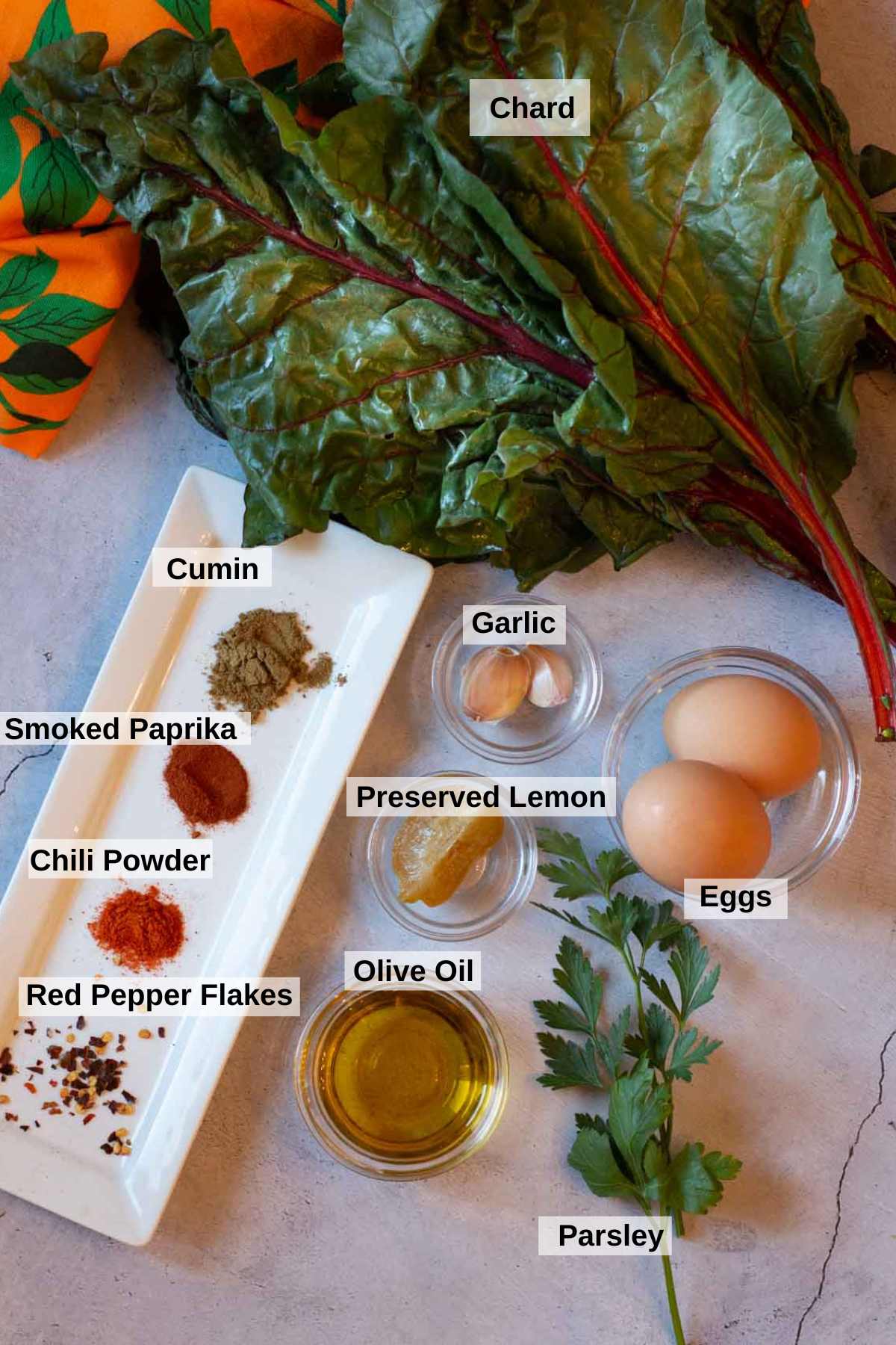 Ingredients to make moroccan breakfast with eggs.