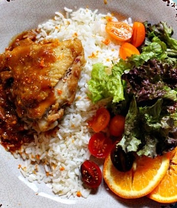 Braised Tangerine Chicken thighs with rice and tossed salad