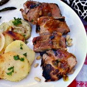 Grilled Pork Tenderloin with Southwestern Zinfandel glaze with a side of sliced potatoes