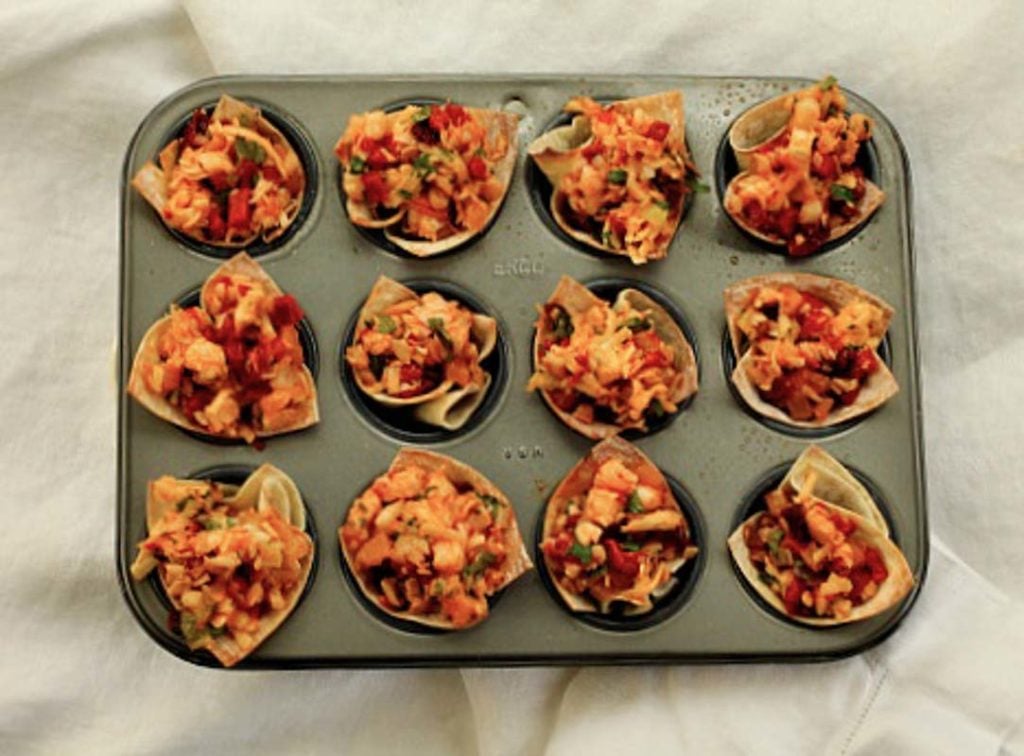 baked shrimp wonton cups in a mini muffin tin