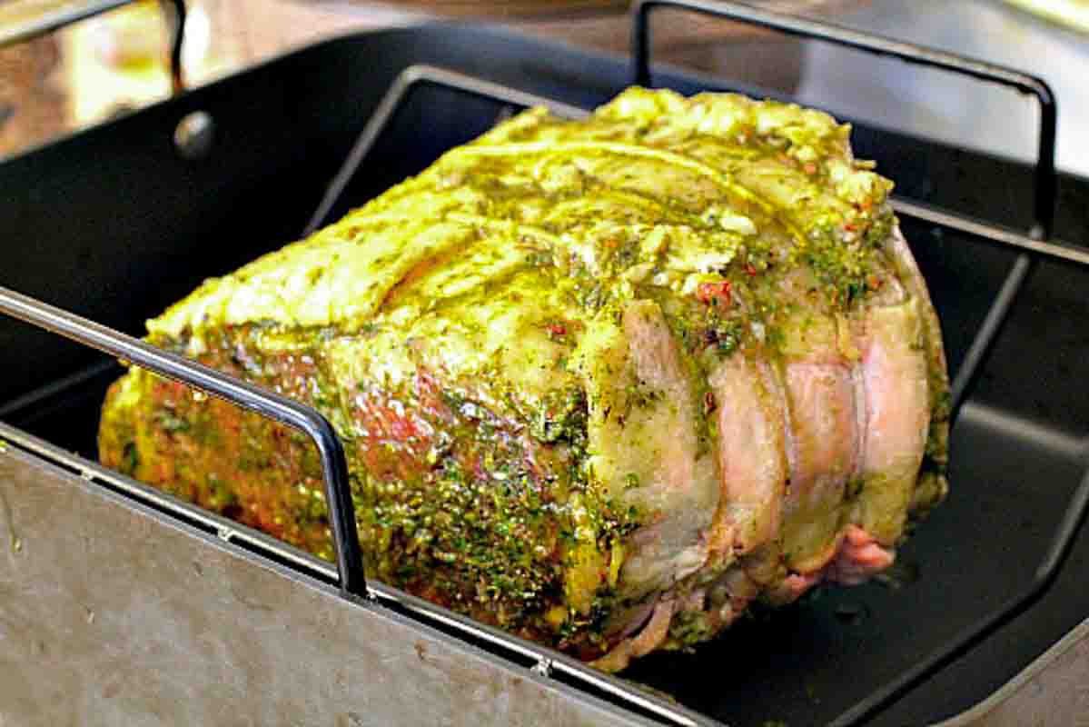 Bone-in prime rib roast in a roasting pan ready to cook.