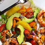 grilled shrimp salad with avocado, orange and tomatoes