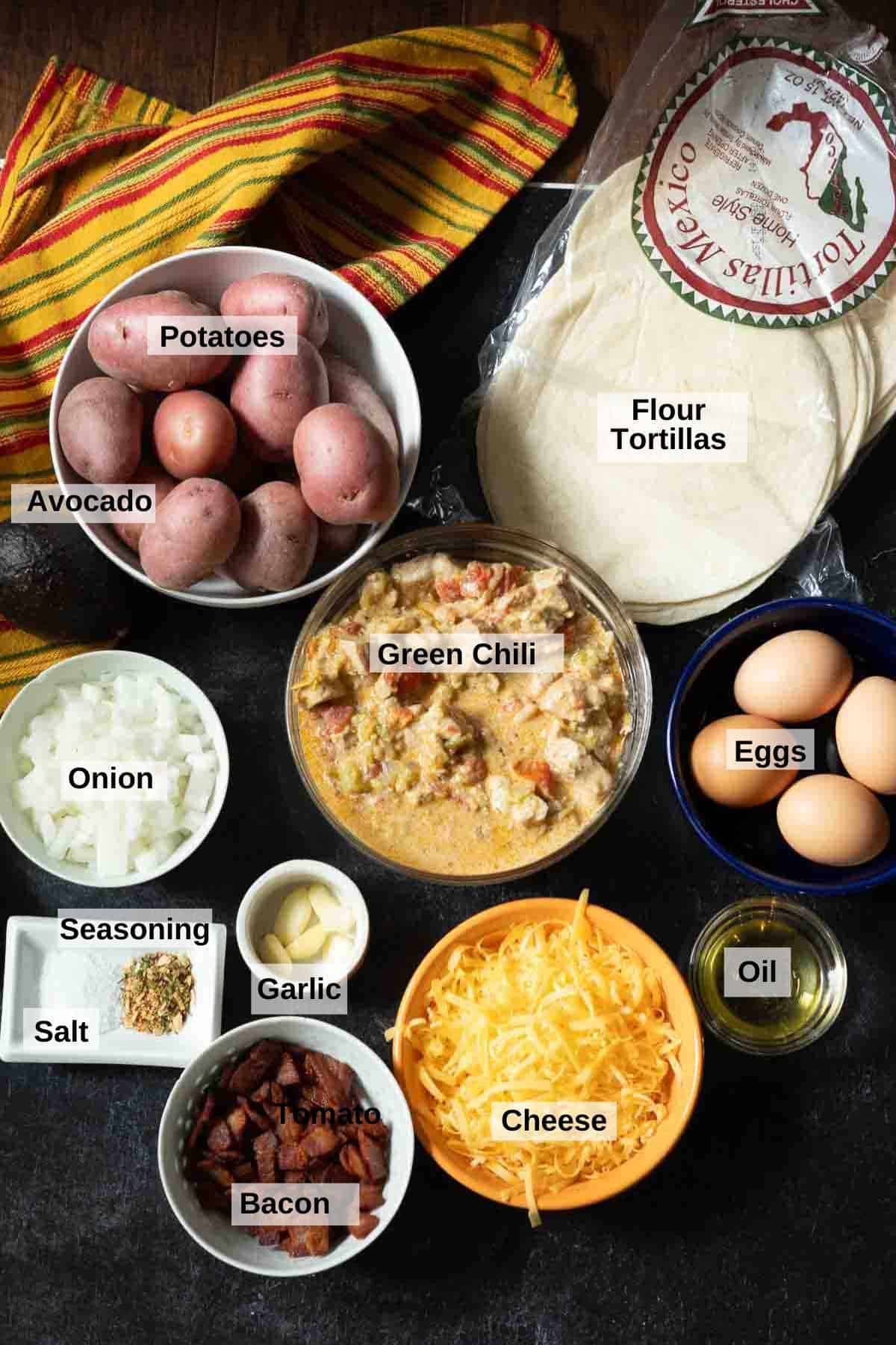Ingredients to make smothered breakfast burritos with potatoes.