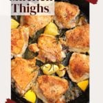 Chicken thighs cooked in a cast iron skillet with garlic and rosemary