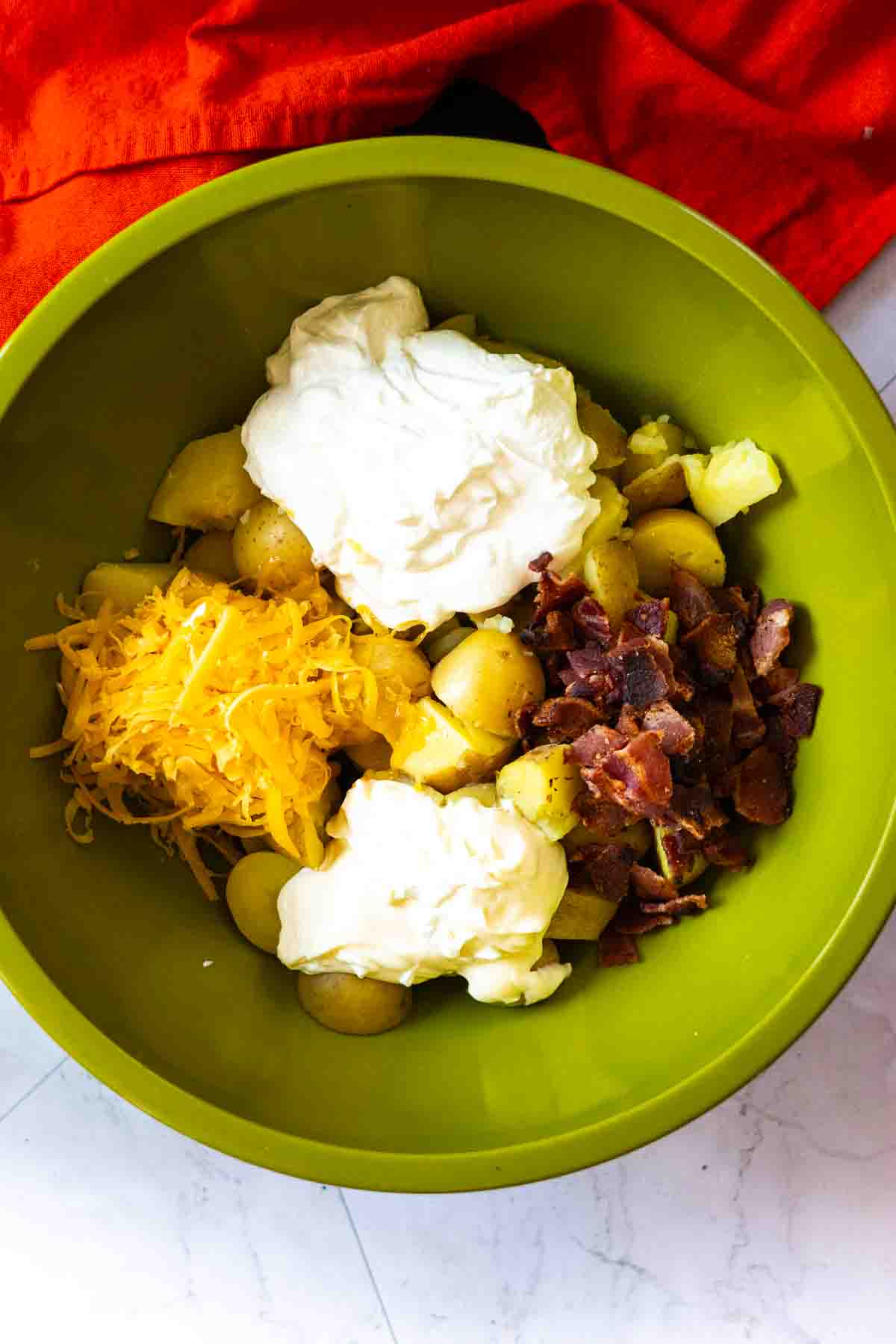 Step 3: Mixing ingredients to make Potato Salad with Bacon.