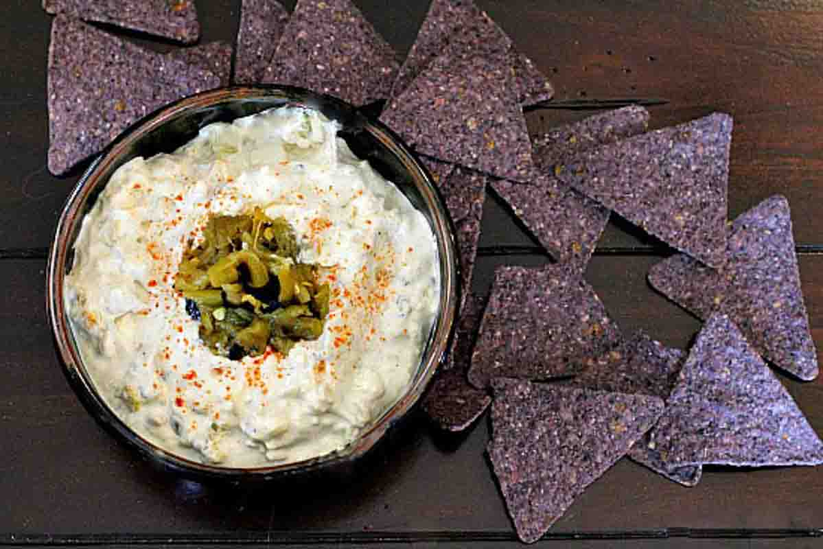 Cream cheese Hatch chile dip served with blue corn tortilla chips.
