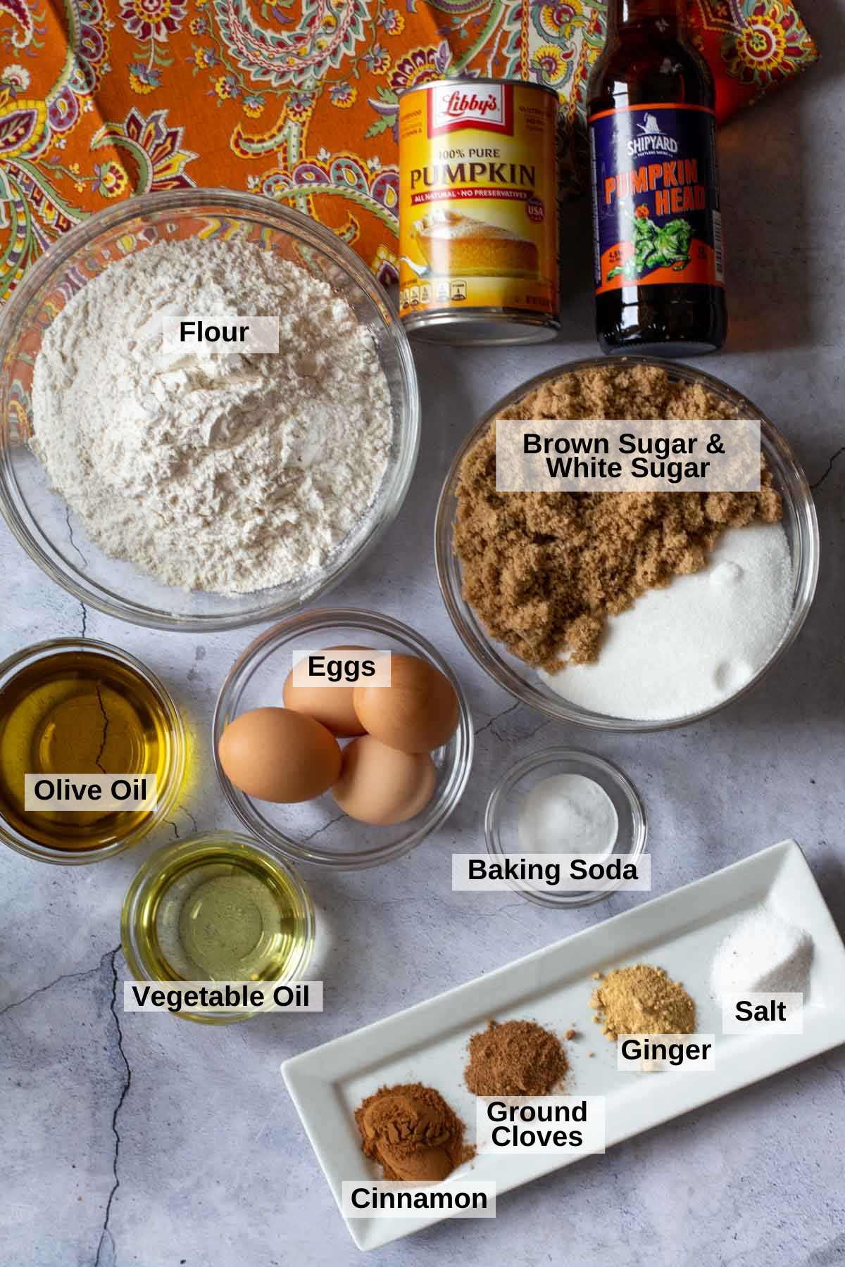 Ingredients to make pumpkin spice bread with pumpkin beer.
