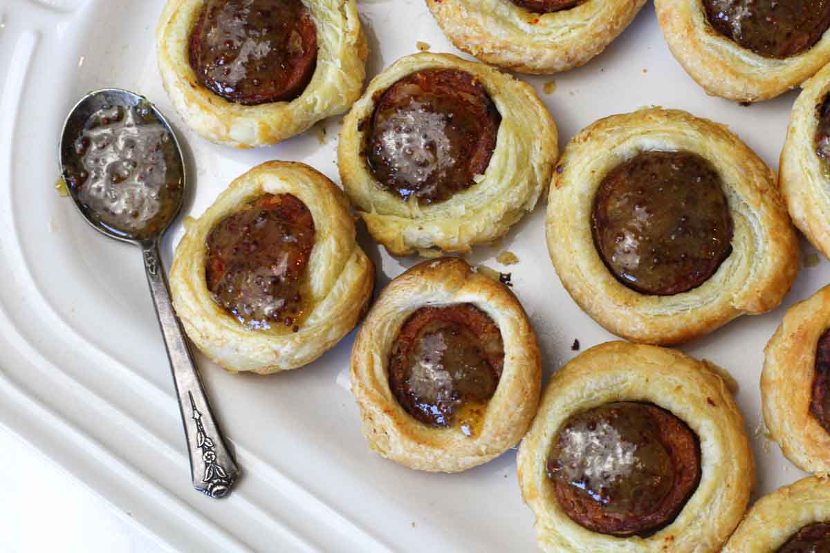Pigs in a blanket using andouille sausage.