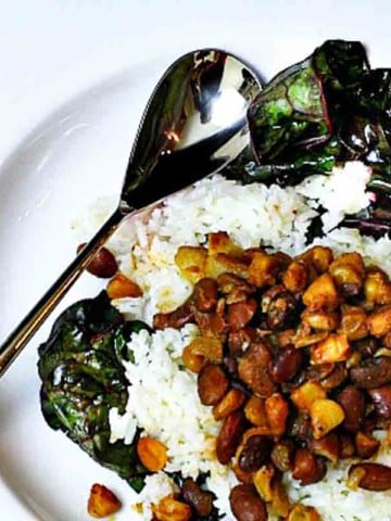 New Mexico beans and chicos served over rice and with swiss chard.