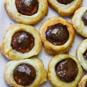 Puff pastry pigs in a blanket with andouille sausage.