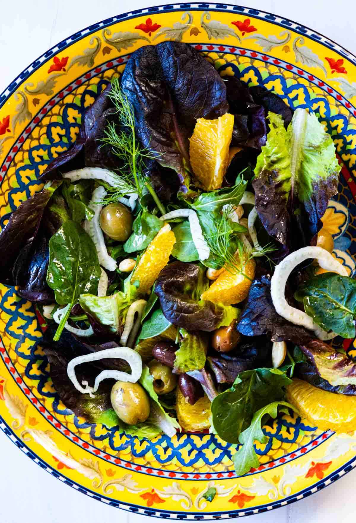 Salad side dish for paella in a Mediterranean bowl.