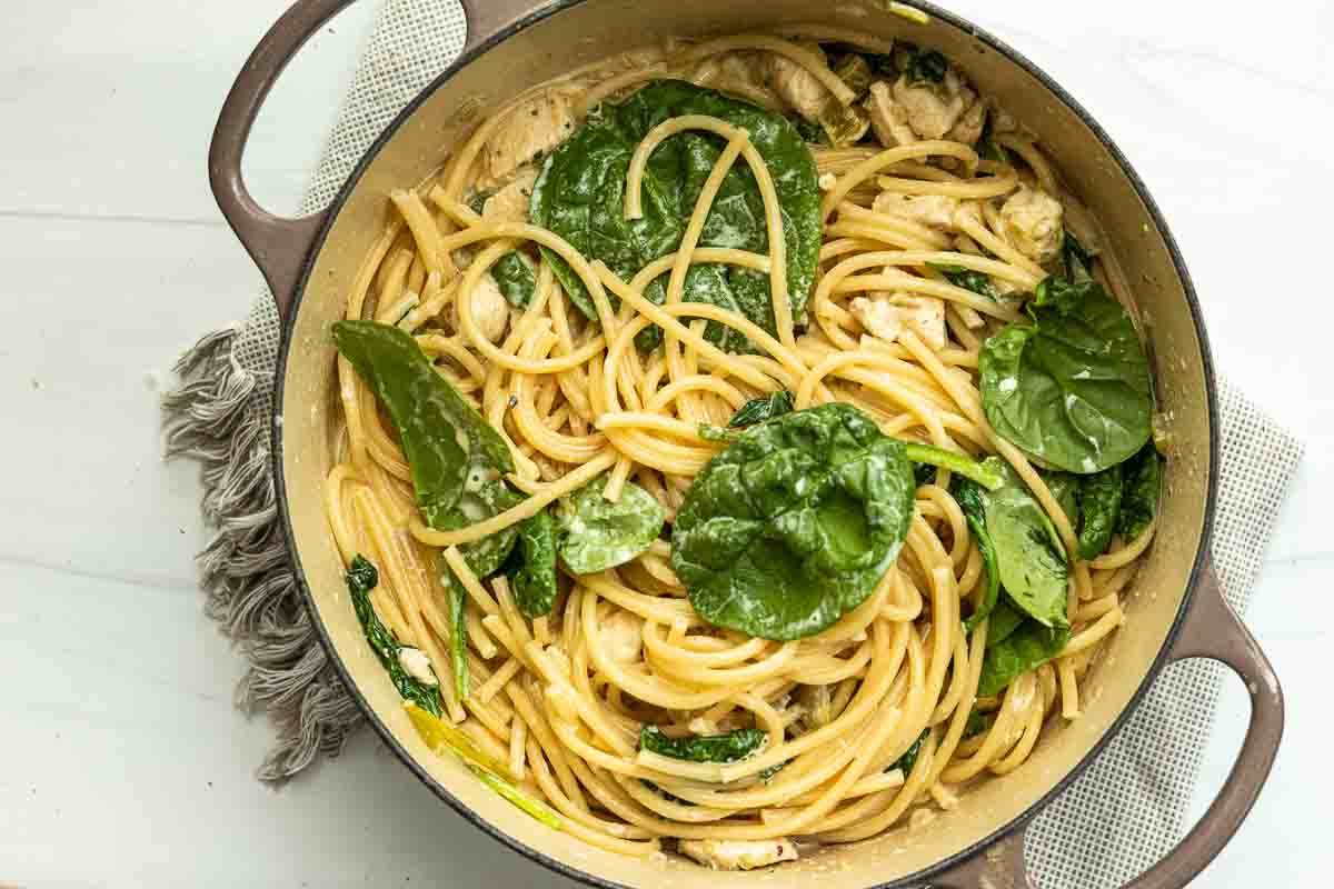 Making Hatch Chile Pasta with Chicken in a Dutch oven.
