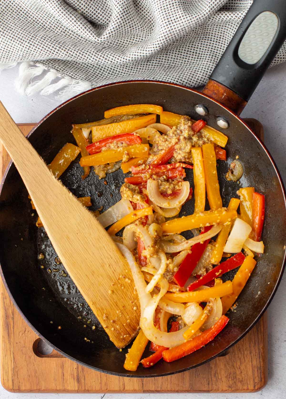 Pan fried strips of orange and red bell pepper.