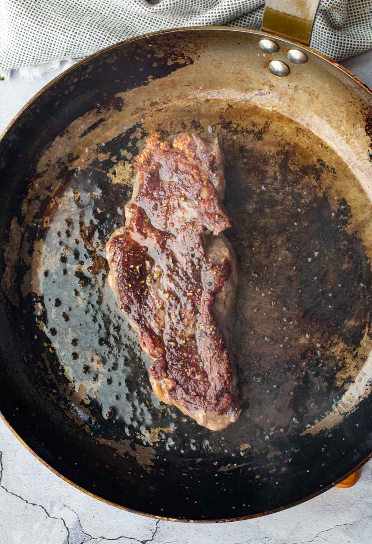 How to pan fry a bison New York strip steak.