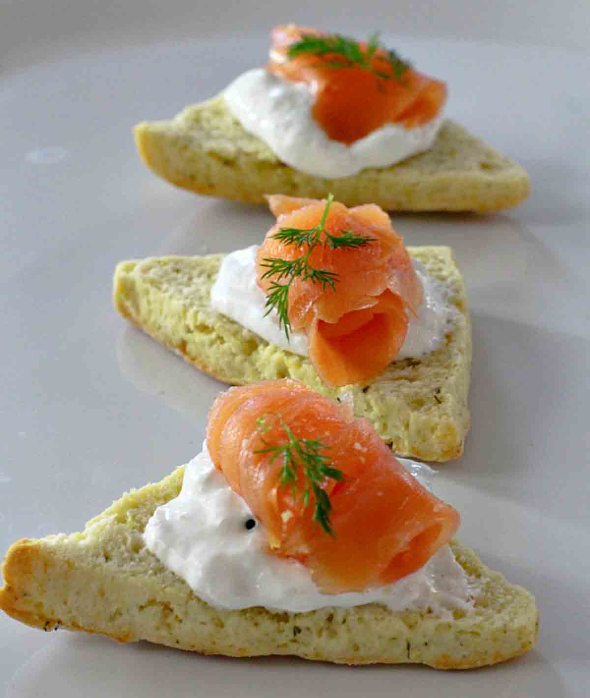 Smoked trout appetizer on dill scones.