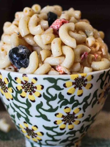 Pioneer Woman Macaroni Salad in a sunflower design bowl.