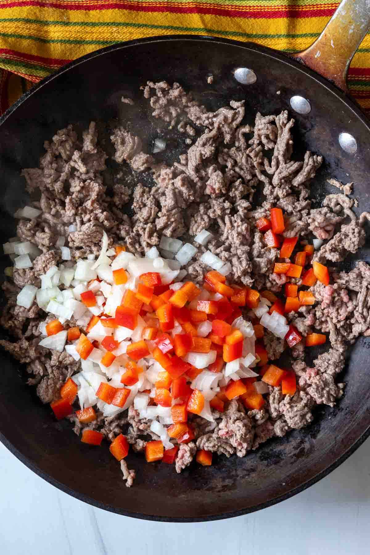 Browning ground beef to make Fried Tacos.