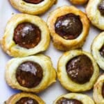 Andouille sausage pigs in a blanket made with Puff Pastry.