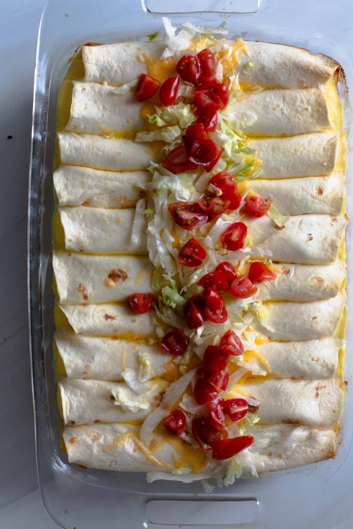Overnight make ahead breakfast burrito casserole in a 9 x 13 pyrex baking dish