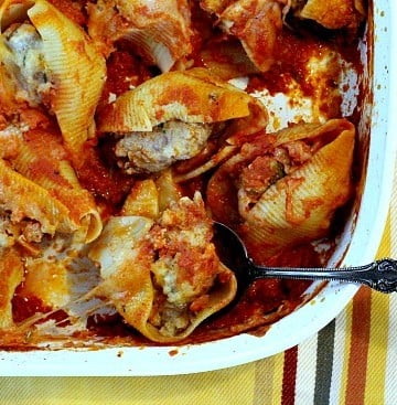 Pork and cheese stuffed jumbo shell casserole. Perfect to feed a crowd.