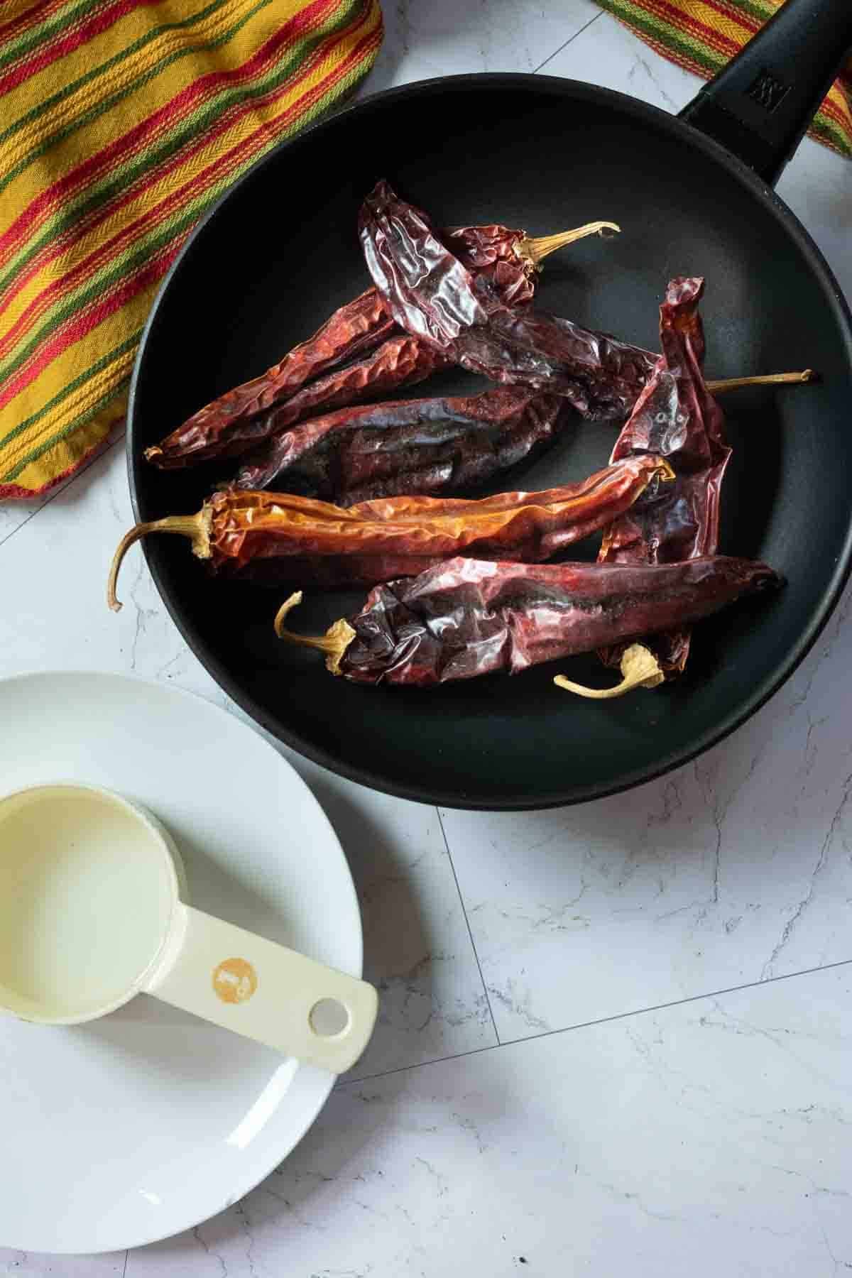 Mexican Pot Roast Step 1: toasting dried chile peppers.