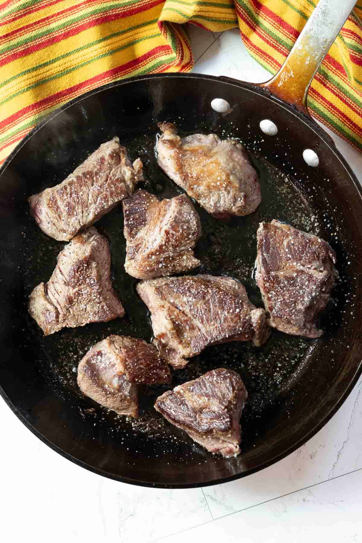 Step 4: Browning chuck roast to make Mexican Pot Roast.