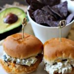 Fried chicken sliders with jalapeno aioli served with blue corn tortilla chips.