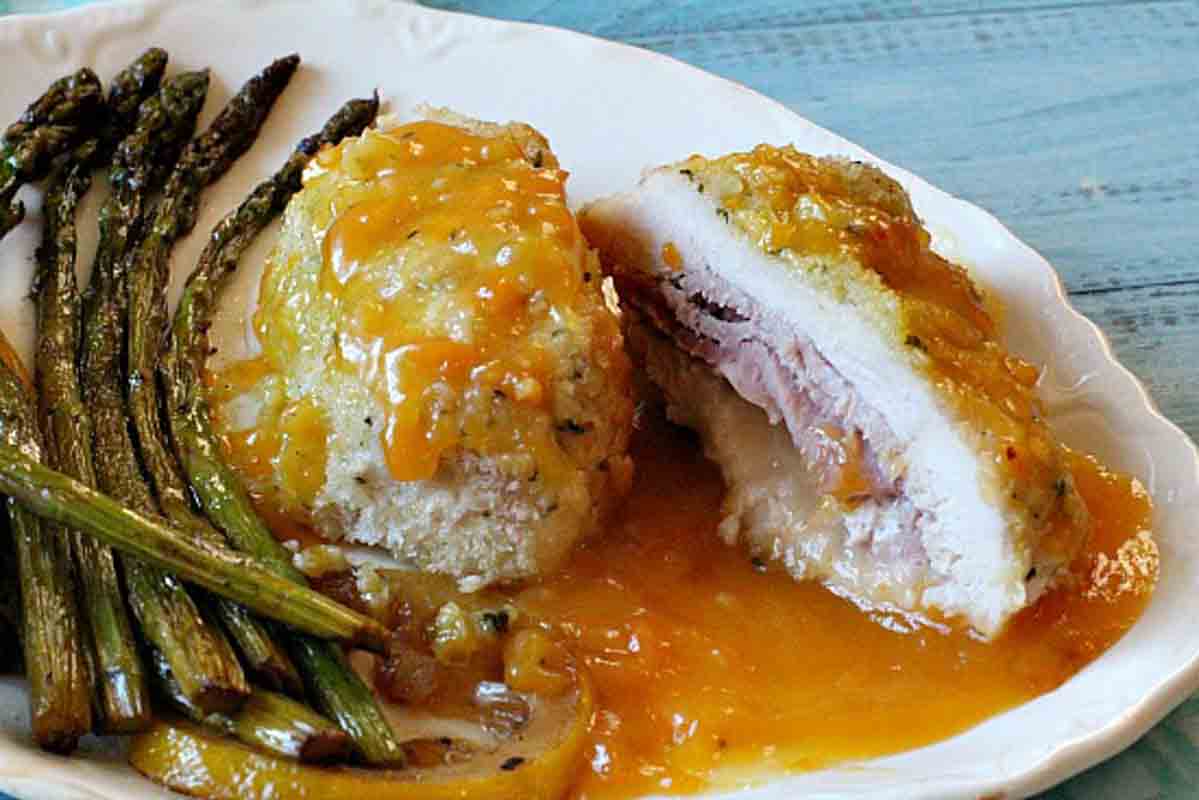 Chicken cordon bleu served with apricot brandy sauce.