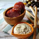 Baked Salami Appetizer with Grainy Mustard Sauce. A unique and exciting salami appetizer recipe.