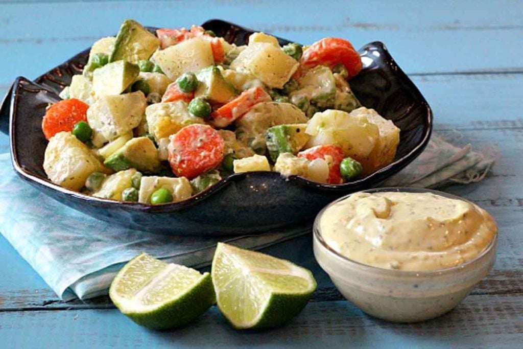 avocado potato salad with carrots and peas and avocado dressing