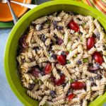 Pasta salad with black beans and cherry tomatoes.