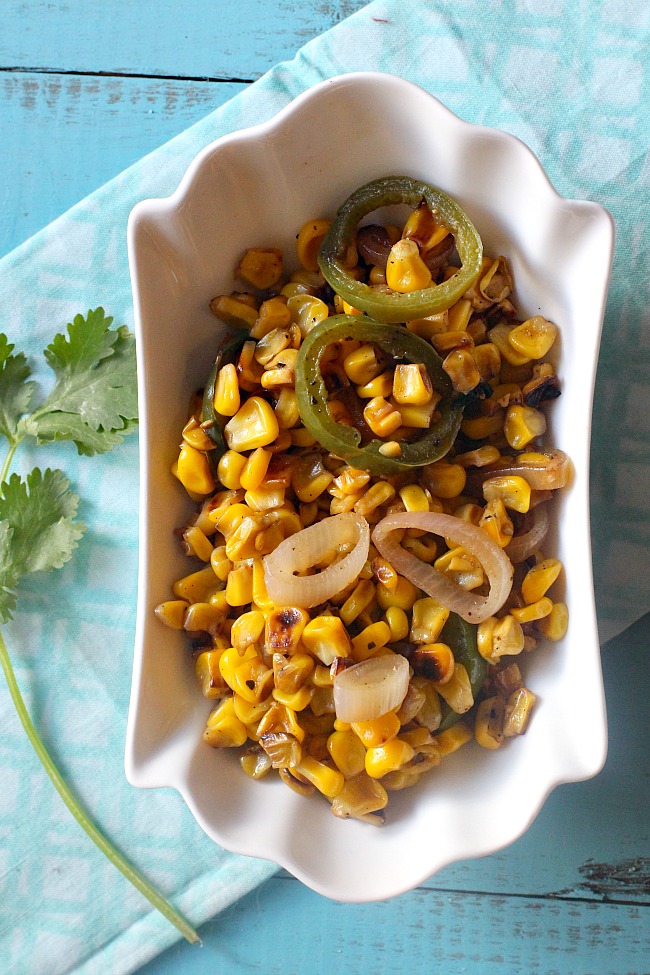 Sweet Corn sauteed in butter until browned and caramelized. With rings of shallots, jalapeno pepper, and lime juice, this is a great Mexican Sweet Corn Recipe.