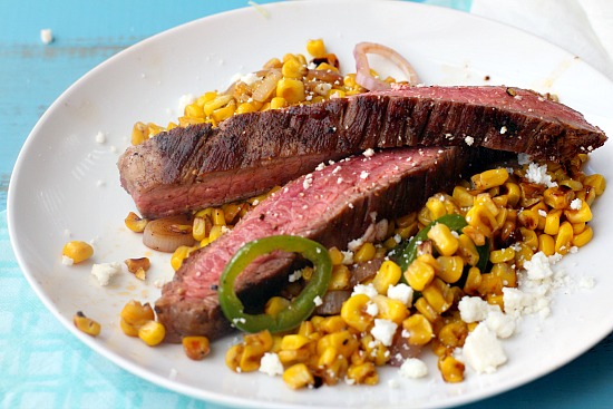 Mexican Flavored Corn topped with Grilled Flank Steak is an easy and healthy Summer meal.