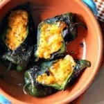 Spicy mashed potato stuffed poblano peppers.