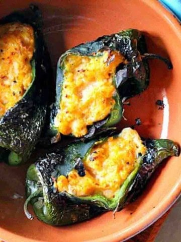 Spicy mashed potato stuffed poblano peppers.