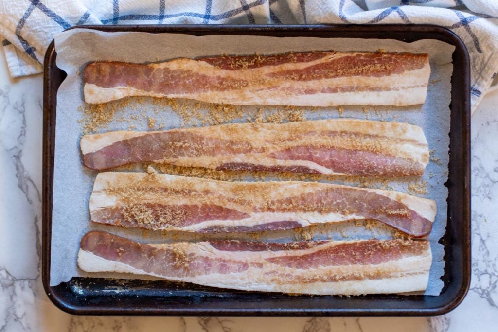 baking bacon in the oven sprinkled with brown sugar