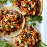 Slow cooker chicken tinga tacos.