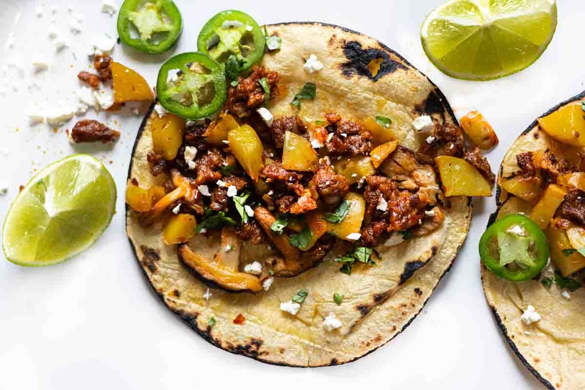 Chorizo tacos with potatoes and mushrooms.