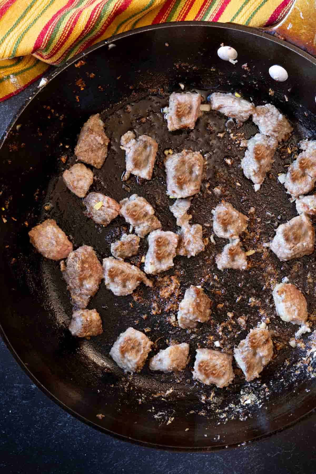 Searing stew meat to make chuck roast chili.