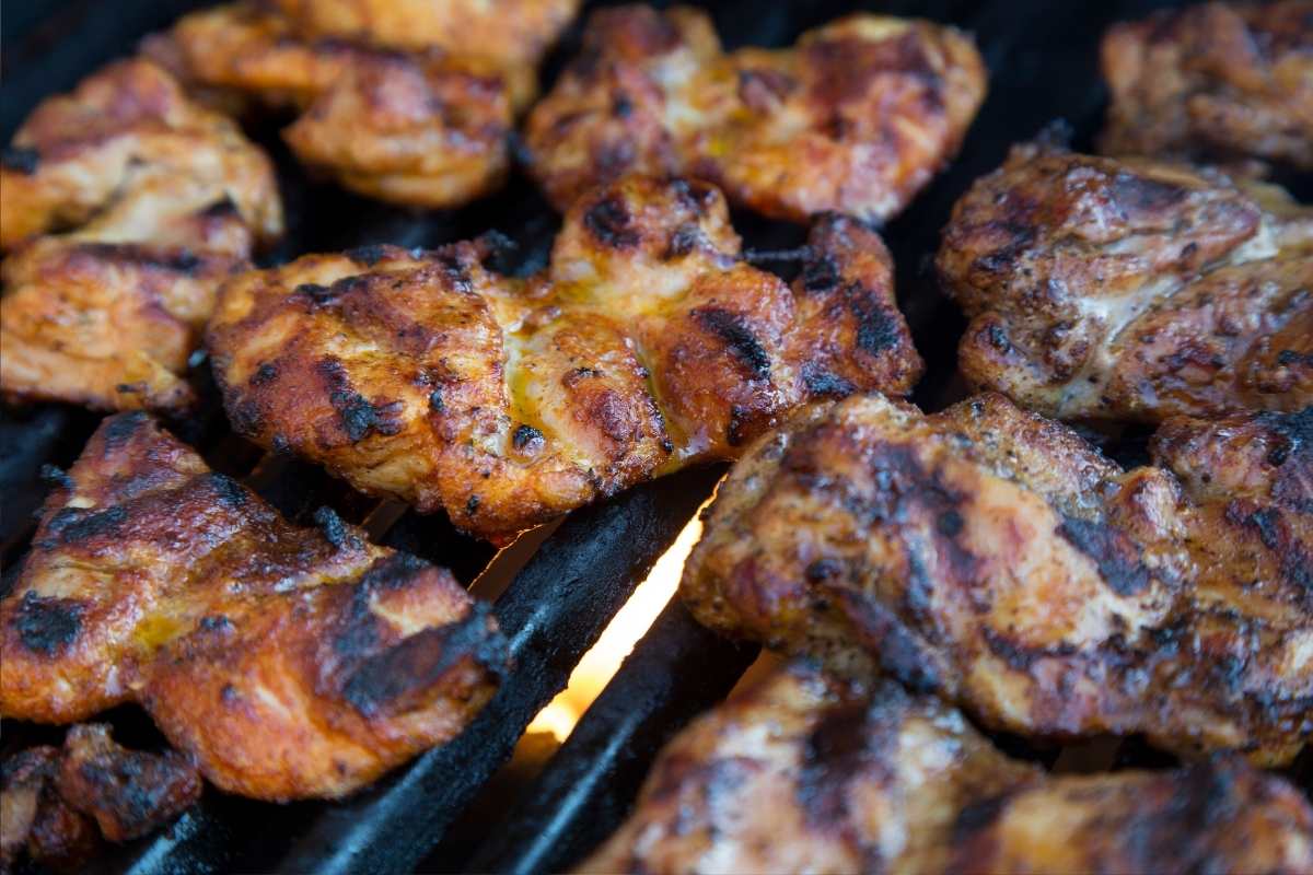 Boneless skinless chicken thighs on the grill.