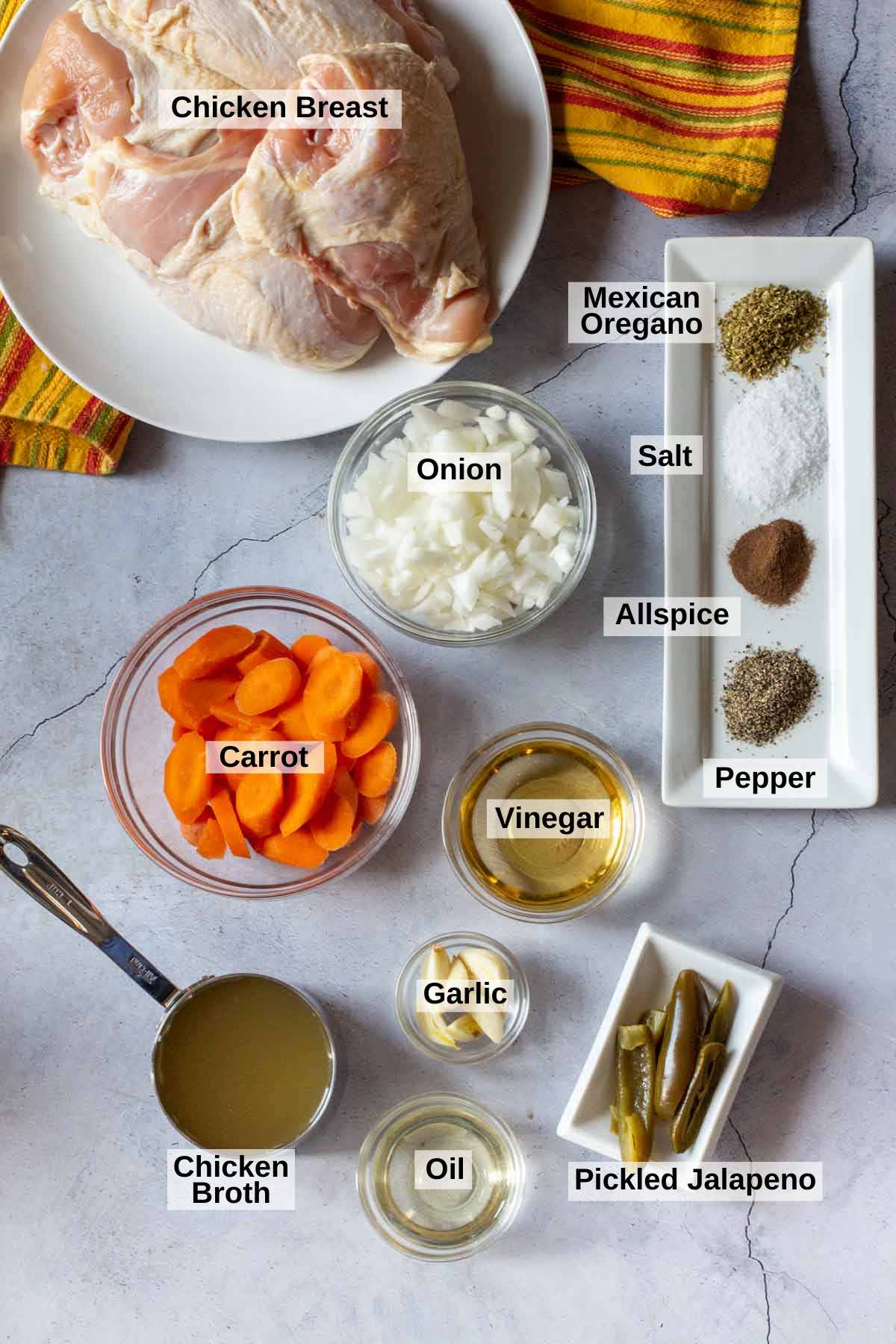 Ingredients to make pollo en escabeche.