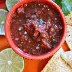 Mexican restaurant salsa in a bowl served with tortilla chips.