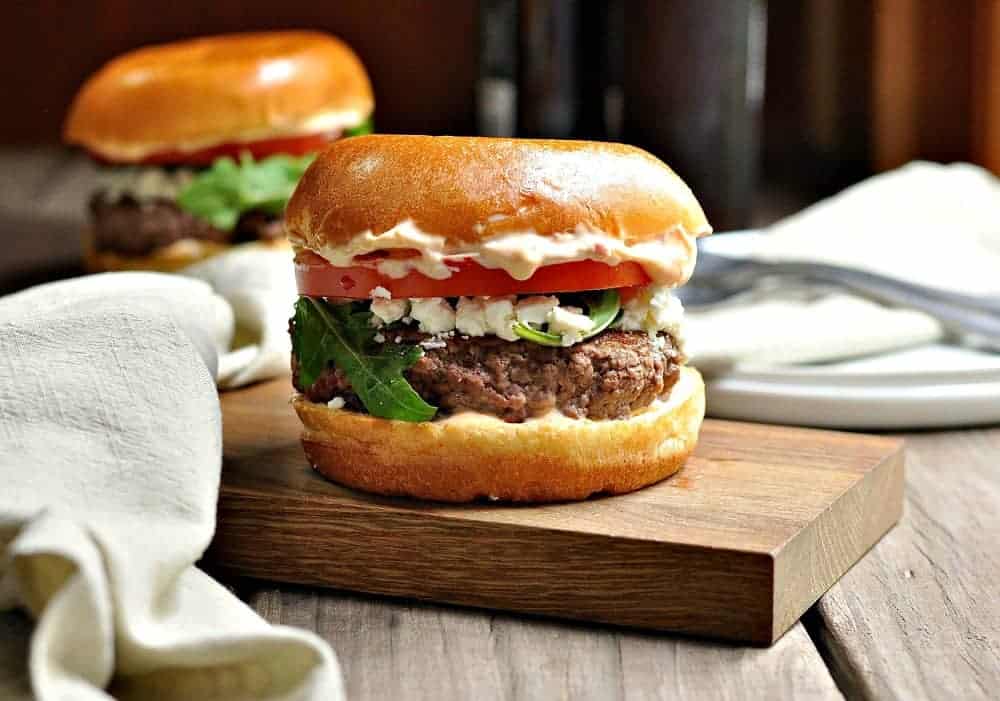 Lamb burger with feta cheese and harissa aioli.