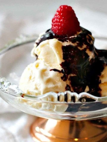 Mexican chocolate sauce with Kahlua served over vanilla ice cream topped with a raspberry.