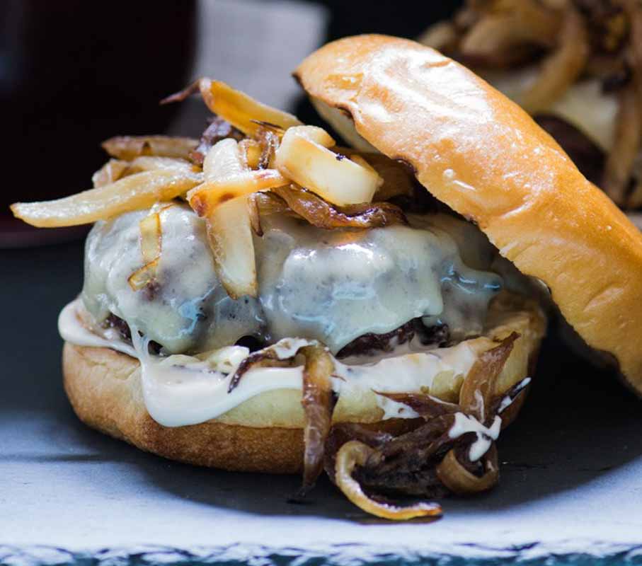 Caramelized onion burger with cheese.