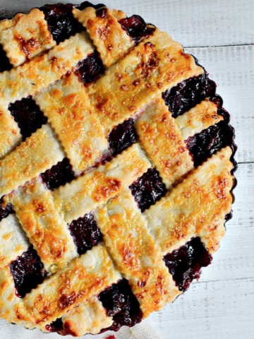 Homemade fresh cherry pie with lattice crust topping.