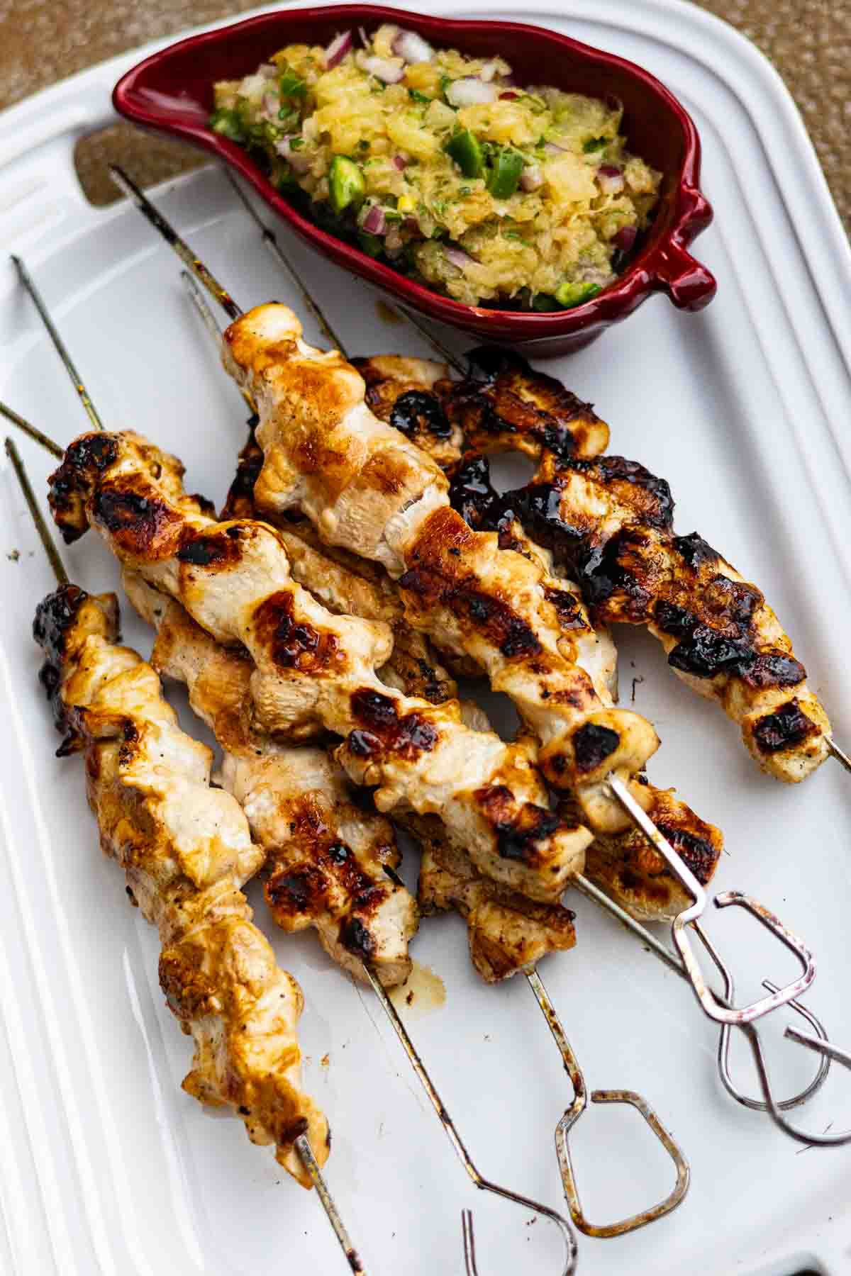 Step 2: Grilled chicken kabobs served with salsa.