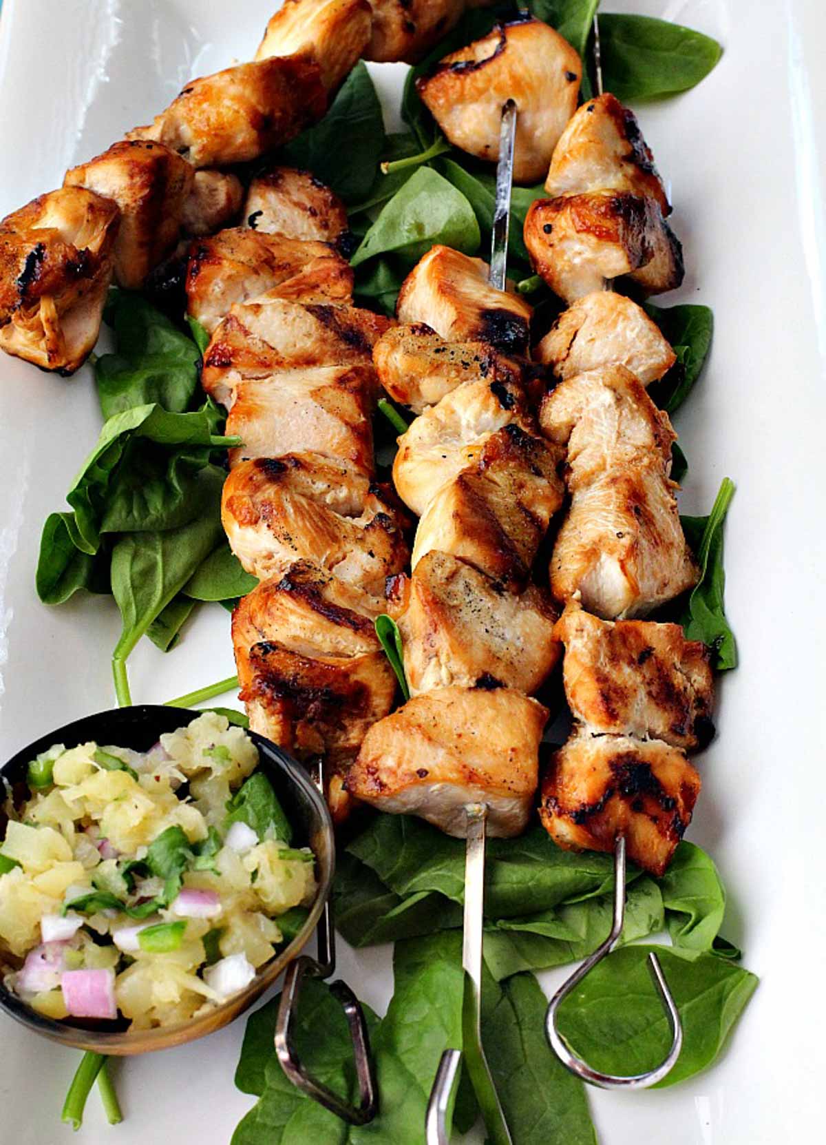 Grilled chicken kabobs with pineapple salsa.